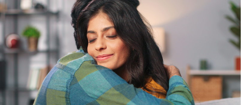 Close portrait couple hugging each other