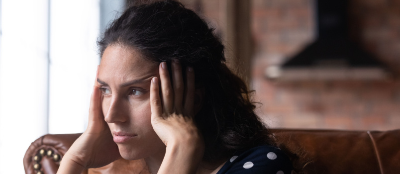 Depressed woman sitting alone 