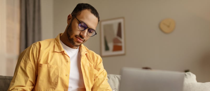 African man using laptop