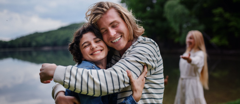 Friends having fun in park together
