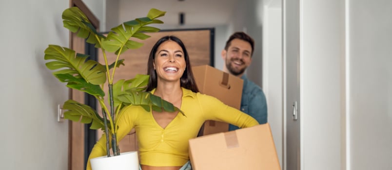 Young couple moving in new house