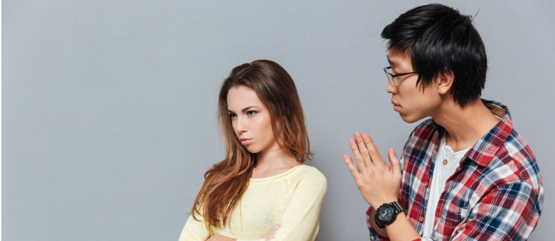 Young man asking for forgiveness