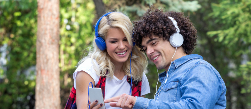 Happy couple listening to music 