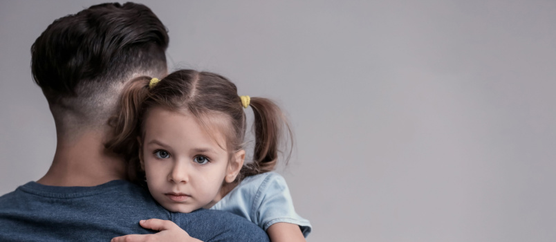 Girl hugging her father