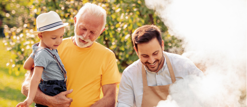 Family having barbeque party in garden