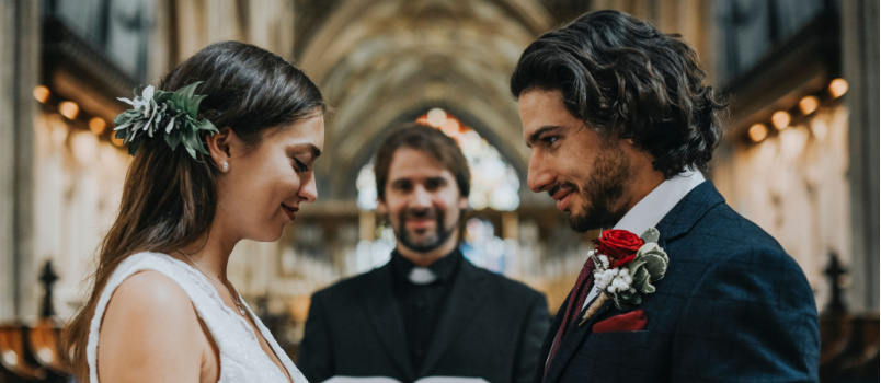 Bride and groom taking vows