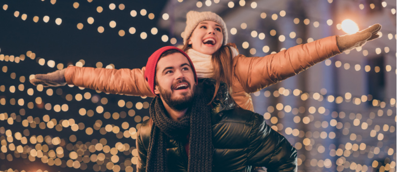 Positive couple having fun on christmas