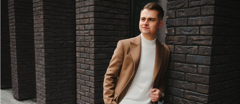 Stylish man dressed standing out in street