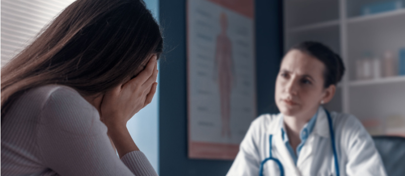 Patient consulting doctor