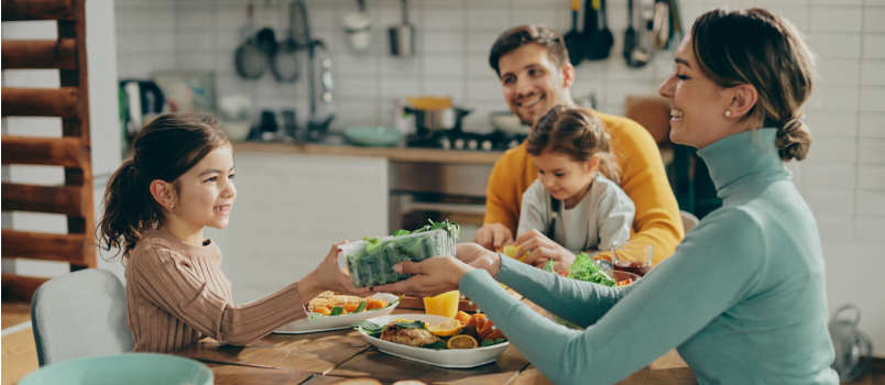 Happy family having lunch together