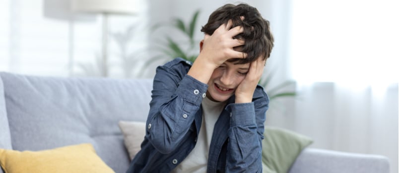 Frustrated young teenager boy