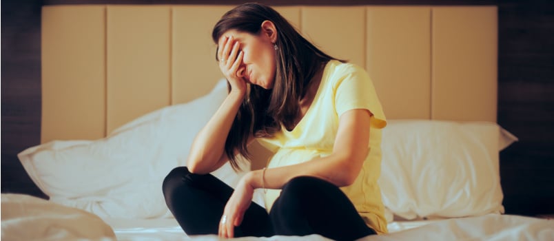 Stressed woman facepalm gesture