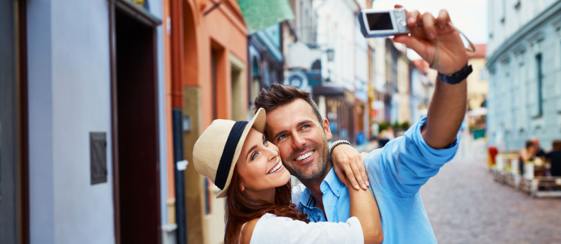 Happy couple taking selfie