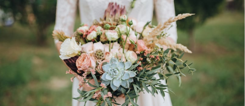 Bride holding flowers in hand
