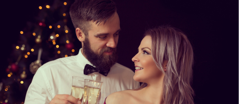 Couple having midnight toast