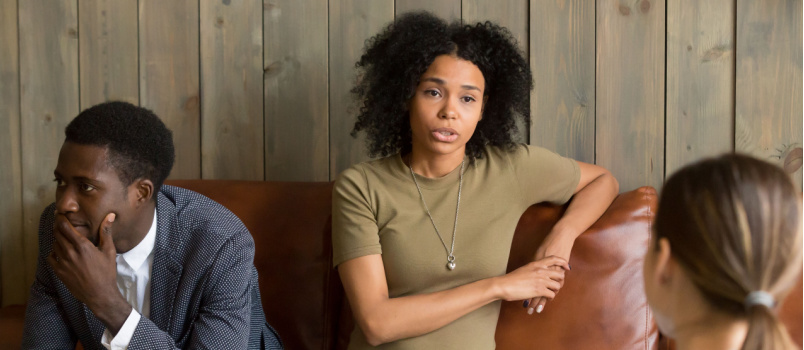 Frustrated woman taking to psychology session