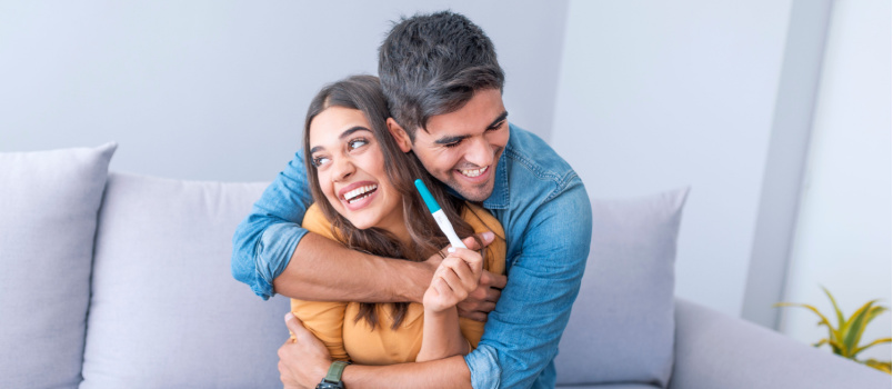 Young couple finding out pregnancy result