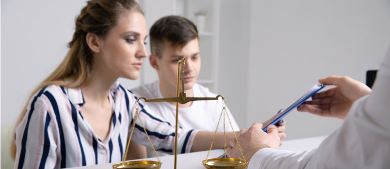 Young renters couple sitting on couch
