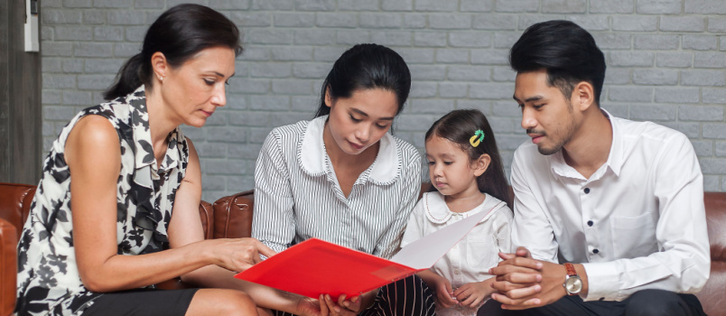 Parents having word with teacher for future plans