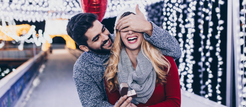 Handsome man proposing woman