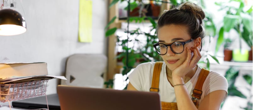 Happy woman using smartphone