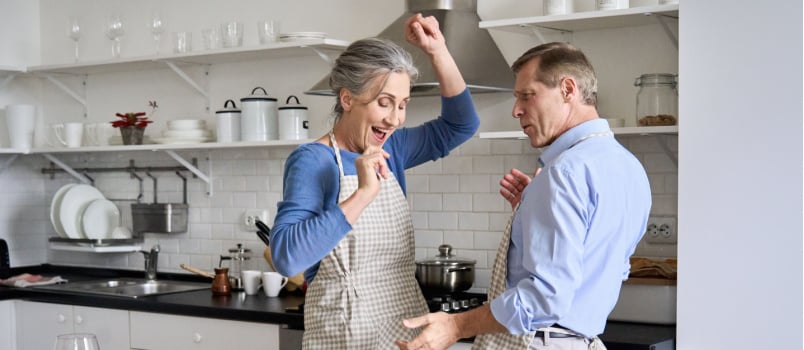 Couple dancing in kitchen