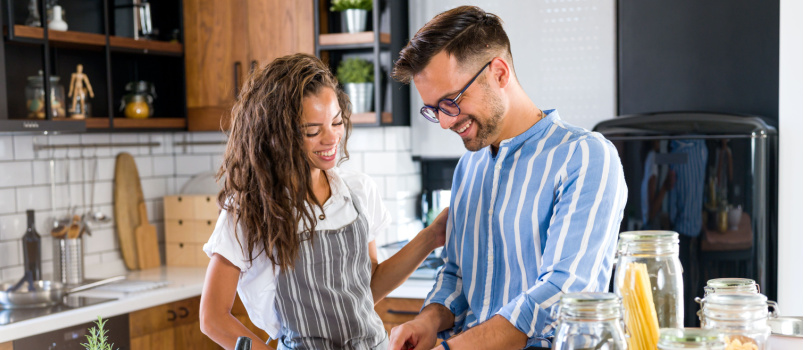 Happy couple cooking together