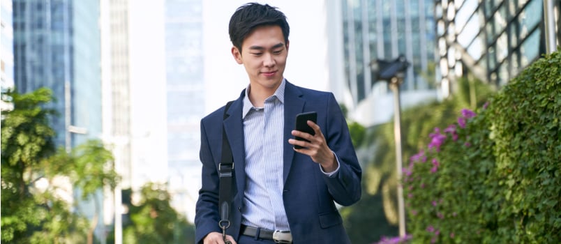 Businessman walking on street