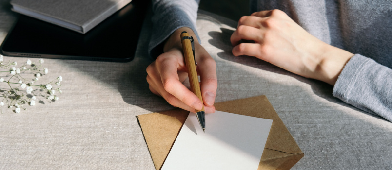 Woman witting romantic letter