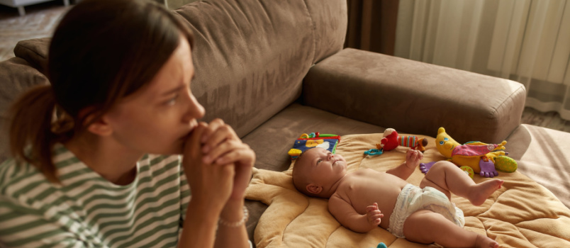 Baby laying on flat pillow