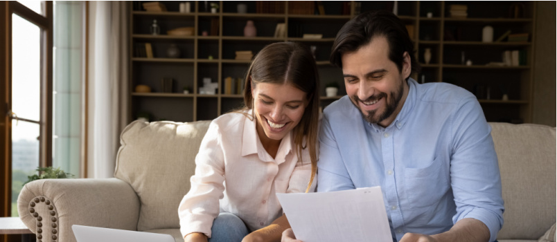 Young couple managing finance