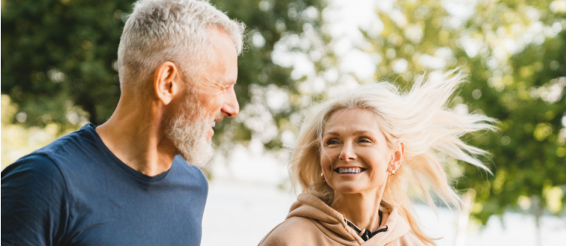 Mature couple running