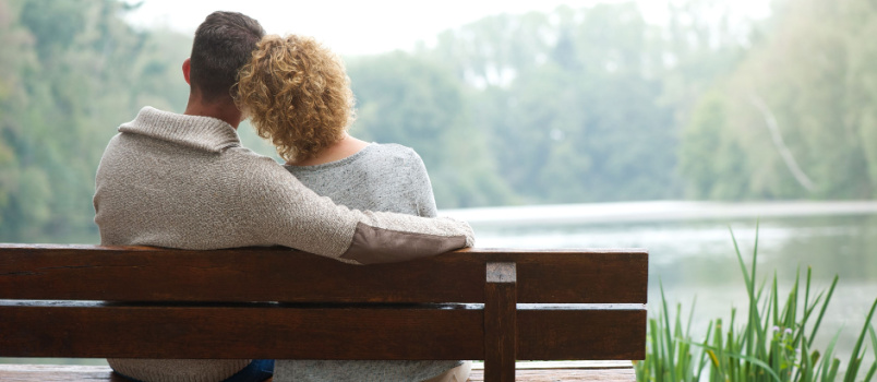 Happy couple sitting together