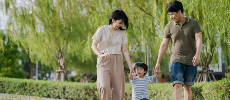 Happy family walking on street