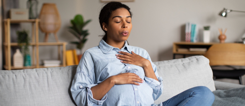 Pregnant woman doing yoga