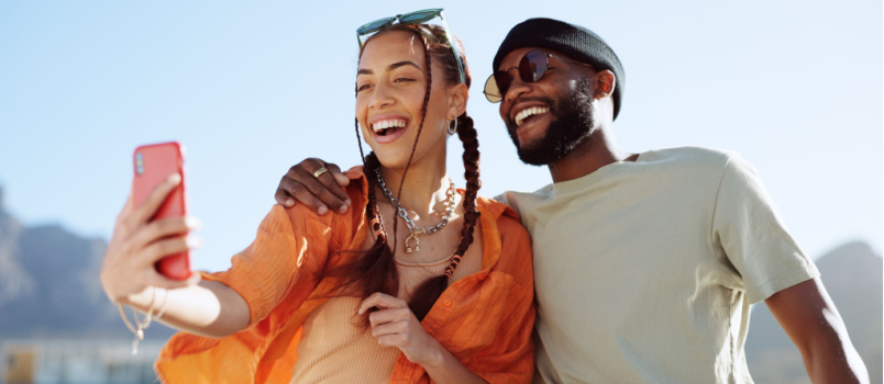 Young couple taking selfie