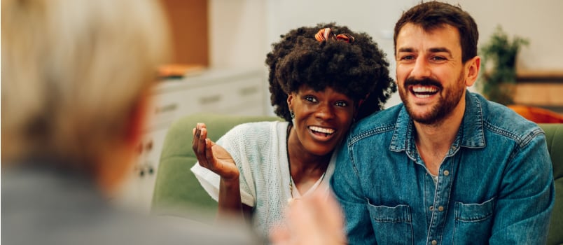 Young couple hugging while smiling