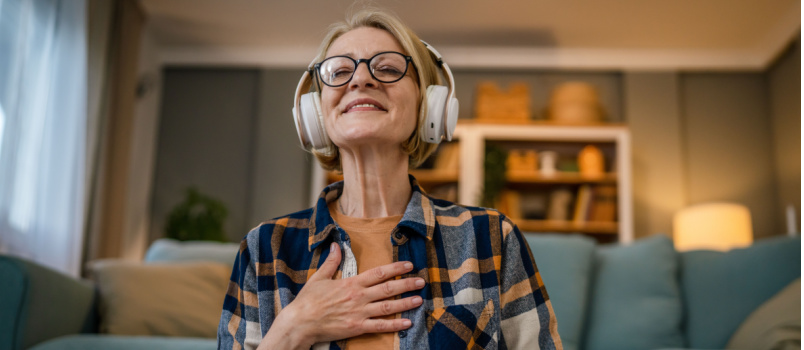 Senior woman listening to music
