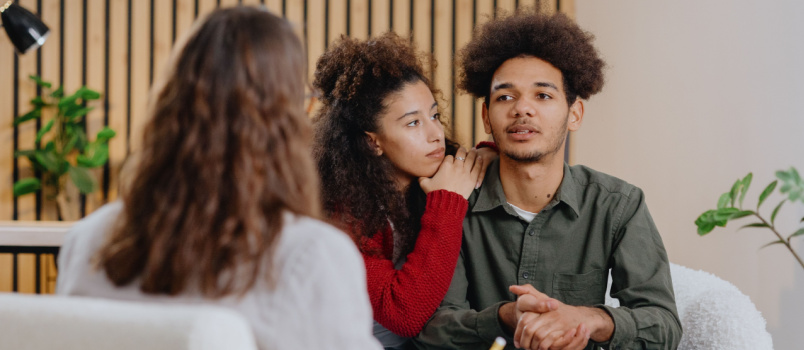 Young couple taking psychology session