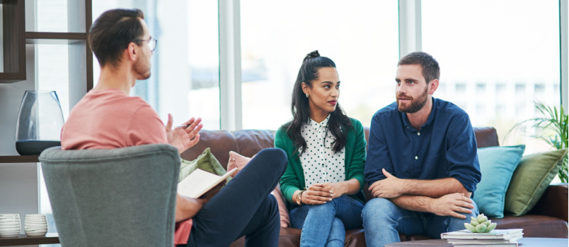 Married couple talking therapy