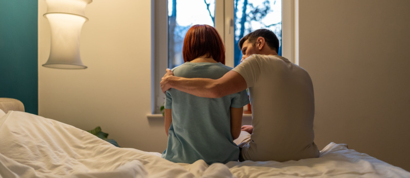 Loving caring man comforting woman