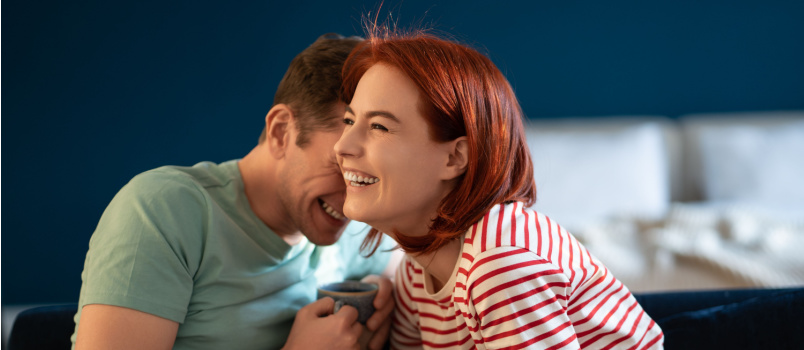 Couple talking laughing
