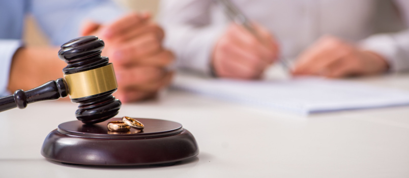 Judge gavel deciding on marriage divorce