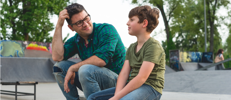 Father and son having conversation