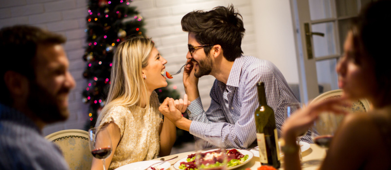 Couple having dinner on charistmas eve