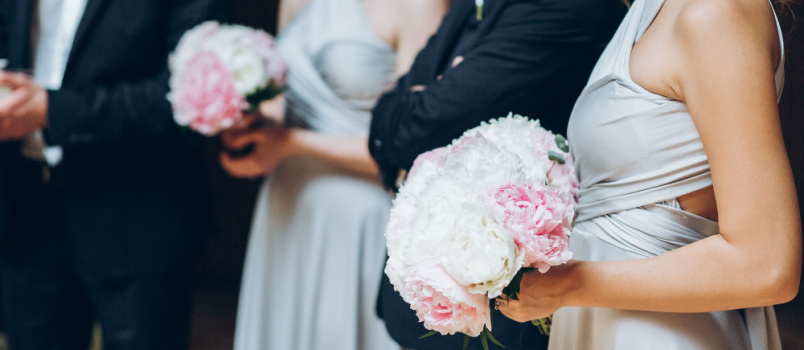 Gorgeous bride holding flowers