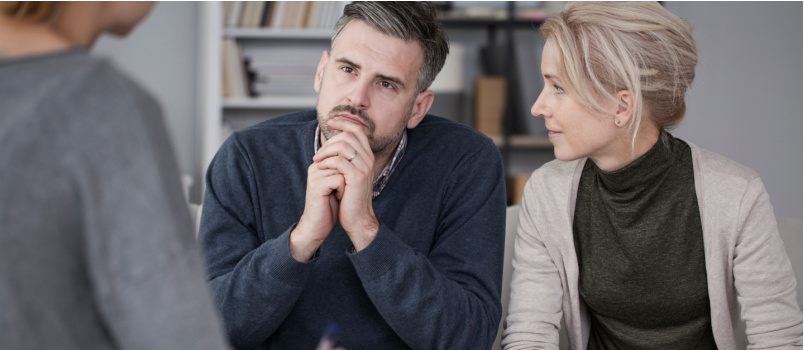 Wife supporting her husband