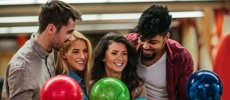 Friends holding balls