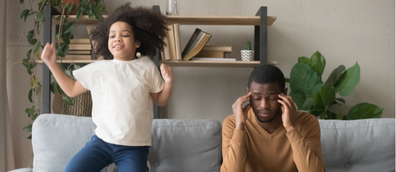 Father having problem while kid having fun