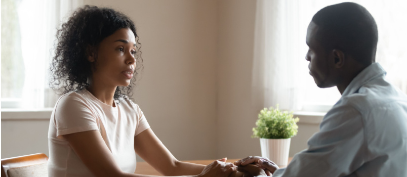 Couple comforting each other